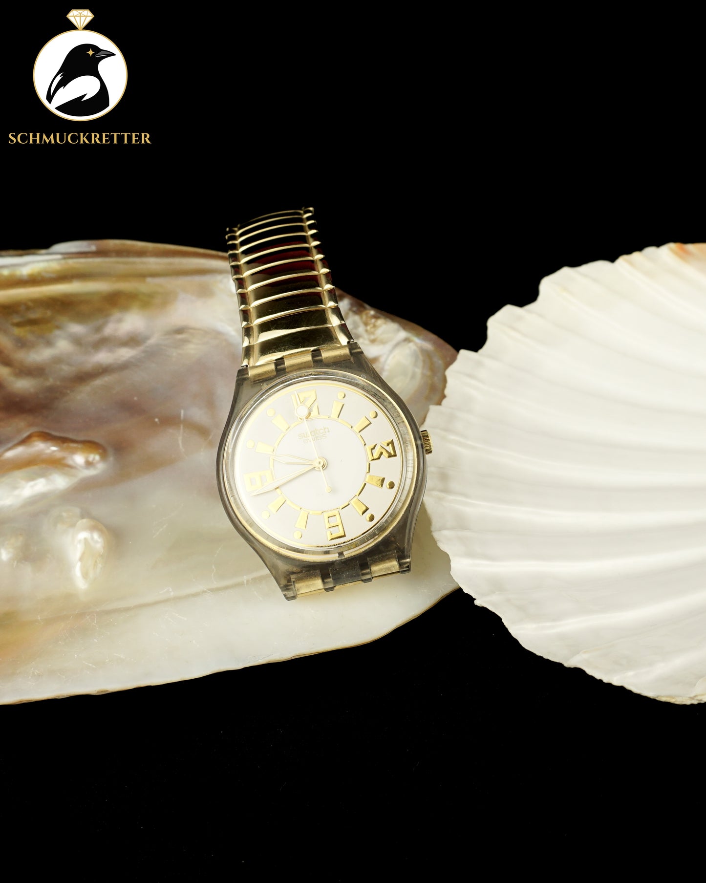 SWATCH Uhr mit vergoldetem Edelstahl-Band, dehnbar