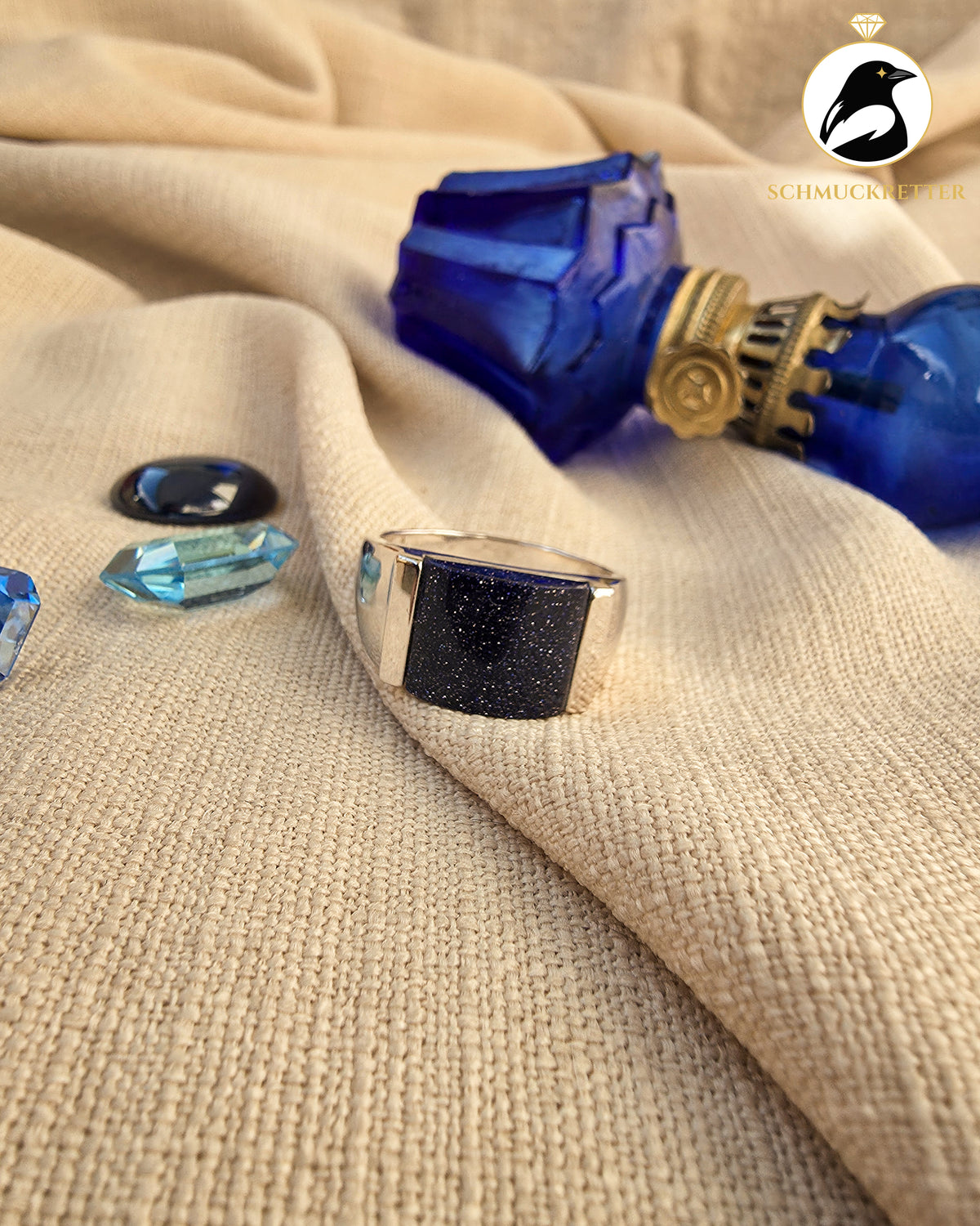 Breiter, rhodinierter Blaufluss-Ring, Gr. 66