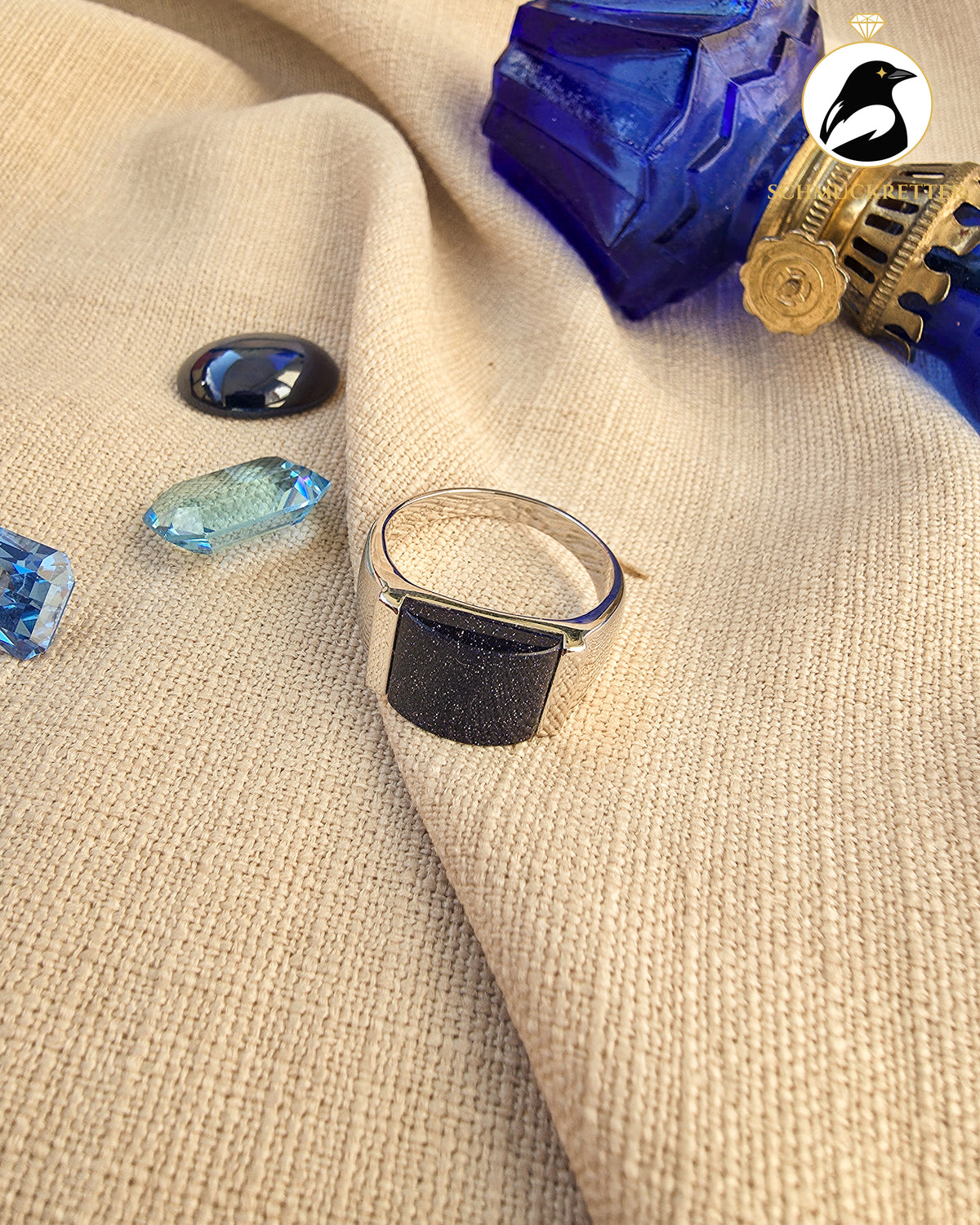 Breiter, rhodinierter Blaufluss-Ring, Gr. 66