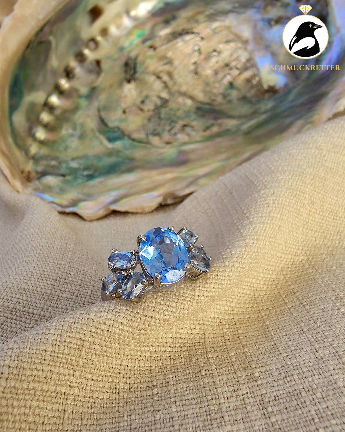 Diamonique Ring mit topasblauen Zirkonia – 925 Silber, Gr. 54
