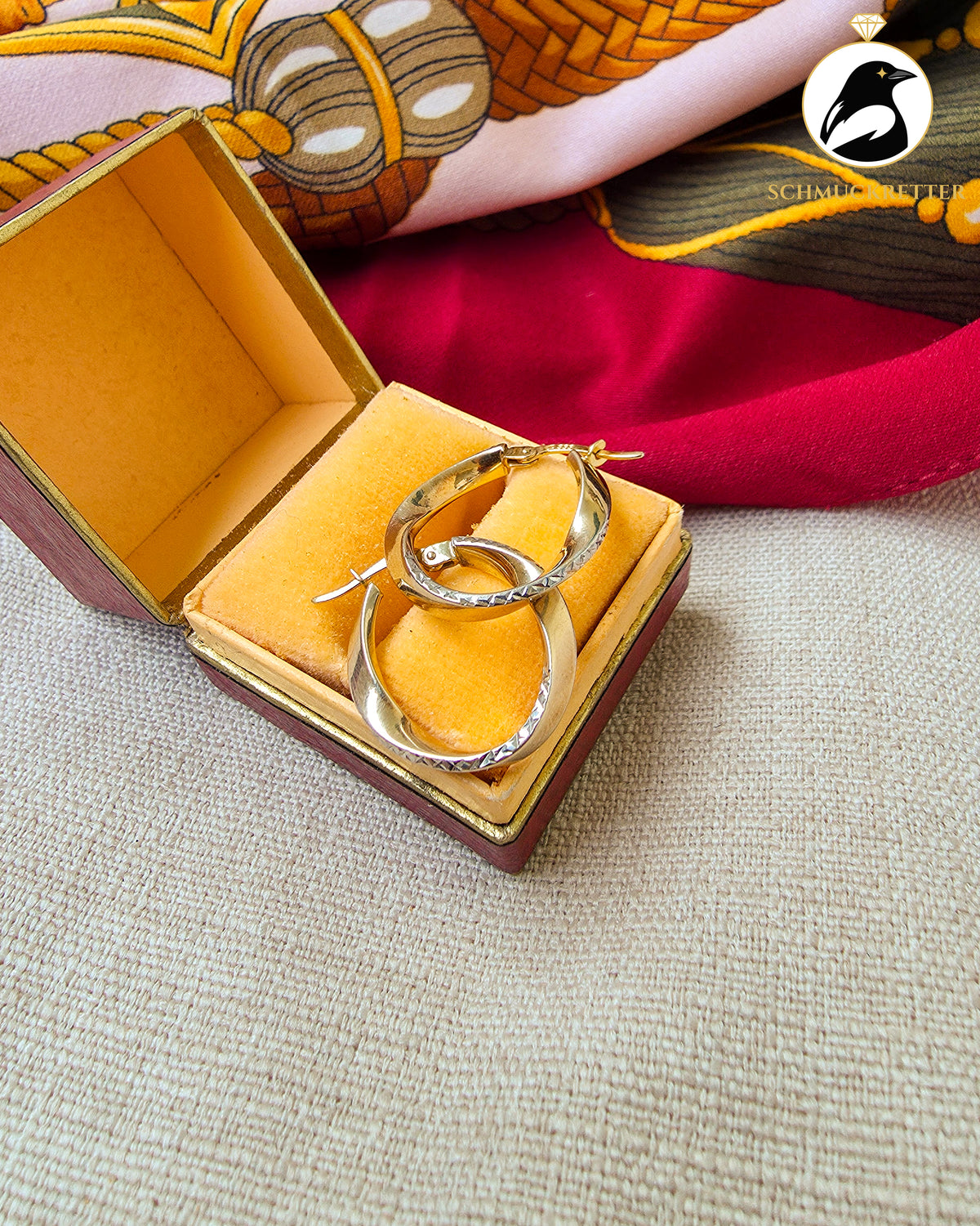 Gedrehte Creolen aus 333 Gold, bicolor
