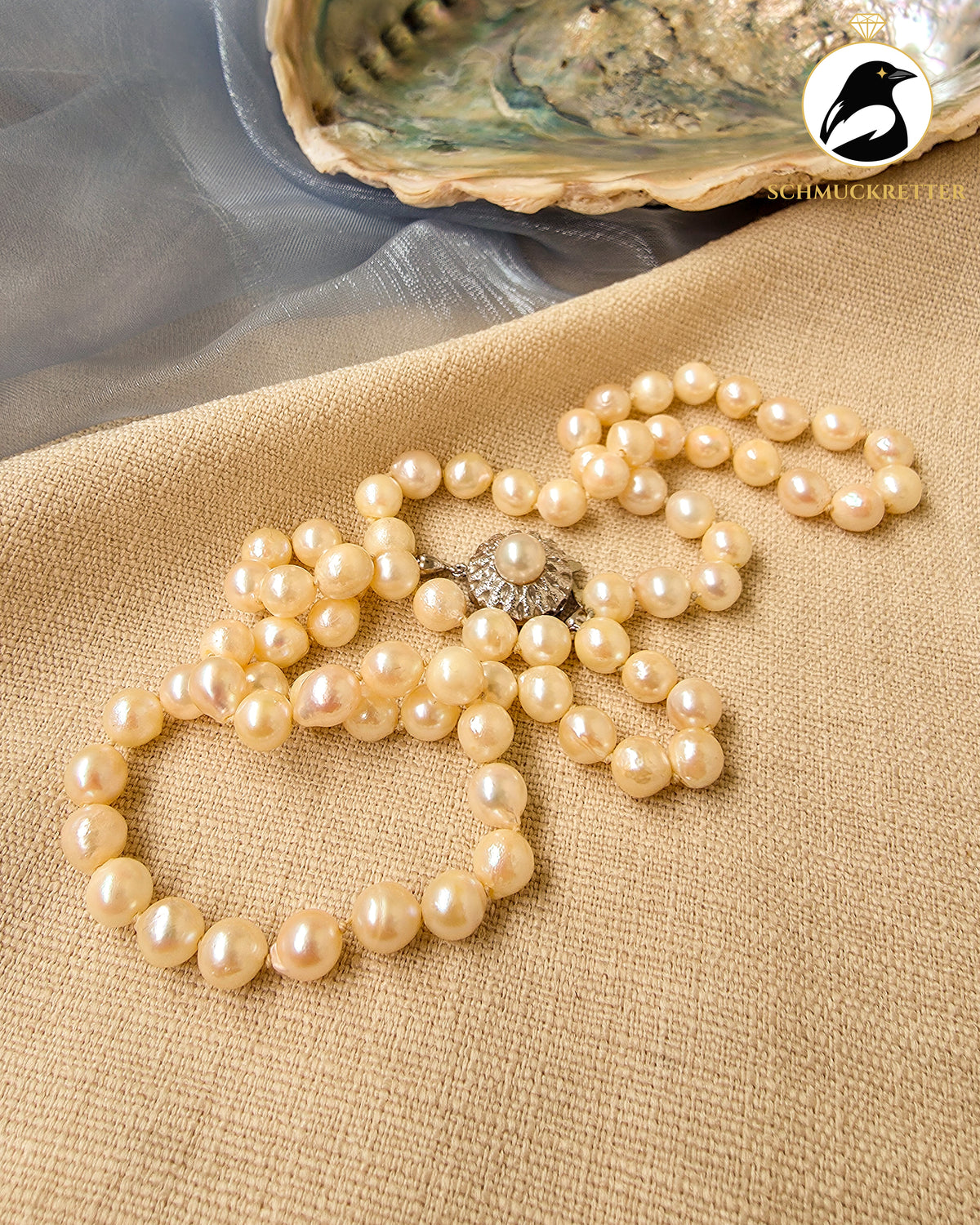Akoya Perlenkette mit floral verziertem 835 Silberverschluss