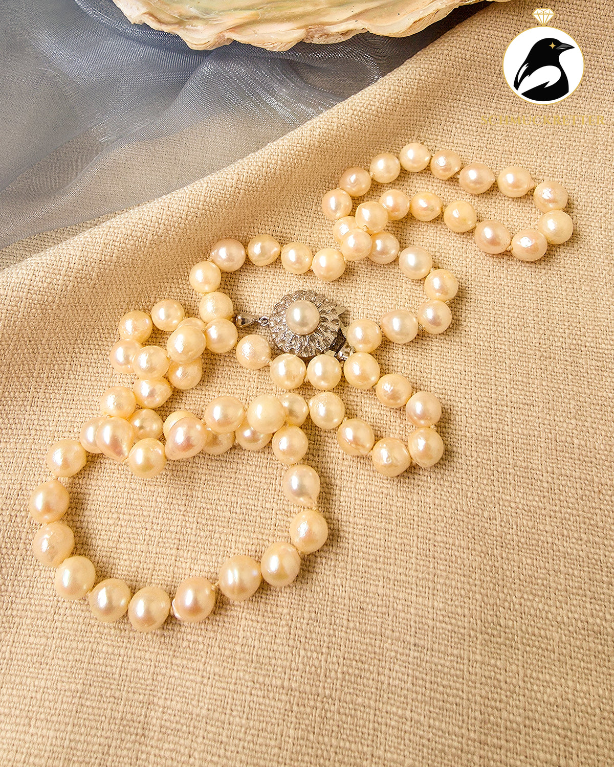 Akoya Perlenkette mit floral verziertem 835 Silberverschluss