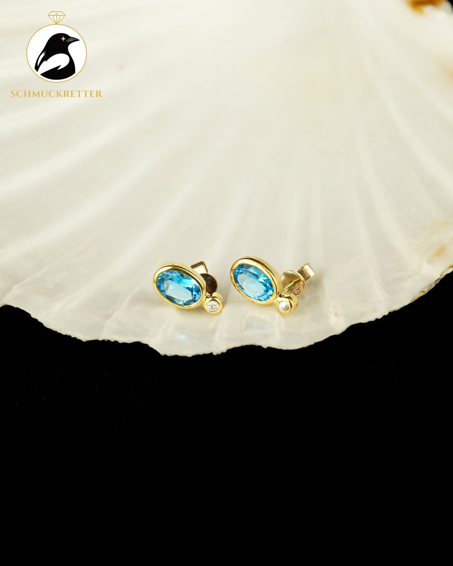 333 Gold Ohrstecker mit blauem Spinell & Zirkonia