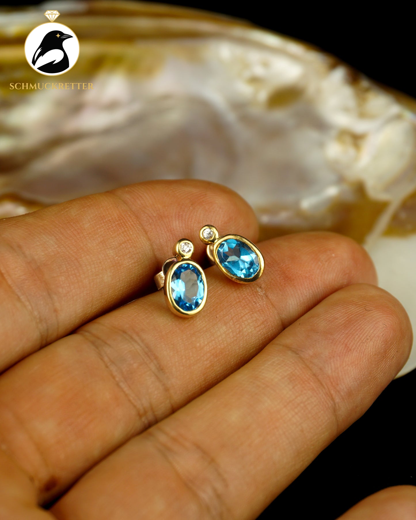 333 Gold Ohrstecker mit blauem Spinell & Zirkonia
