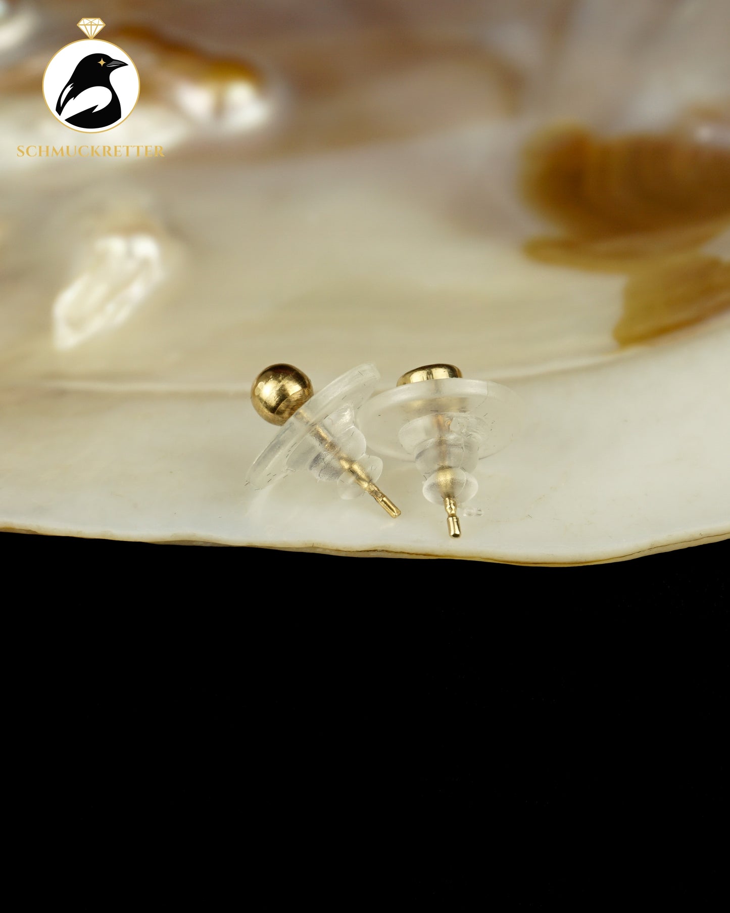 Zwei einzelne 585 Gold Ohrstecker