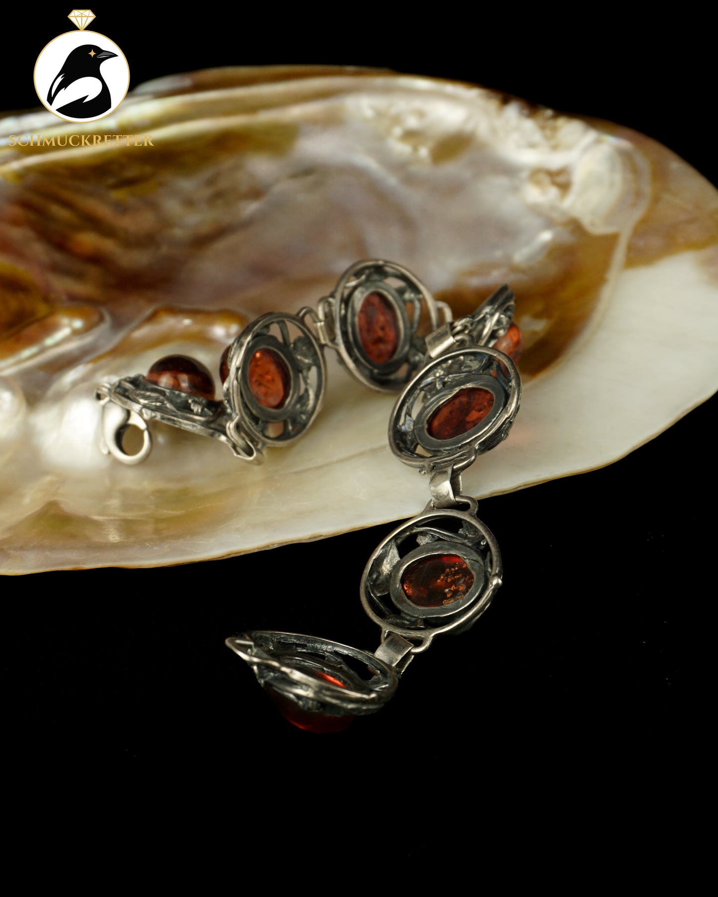 Bernsteinfeuer – verziertes 925 Silber Armband mit Bernstein aus Danzig