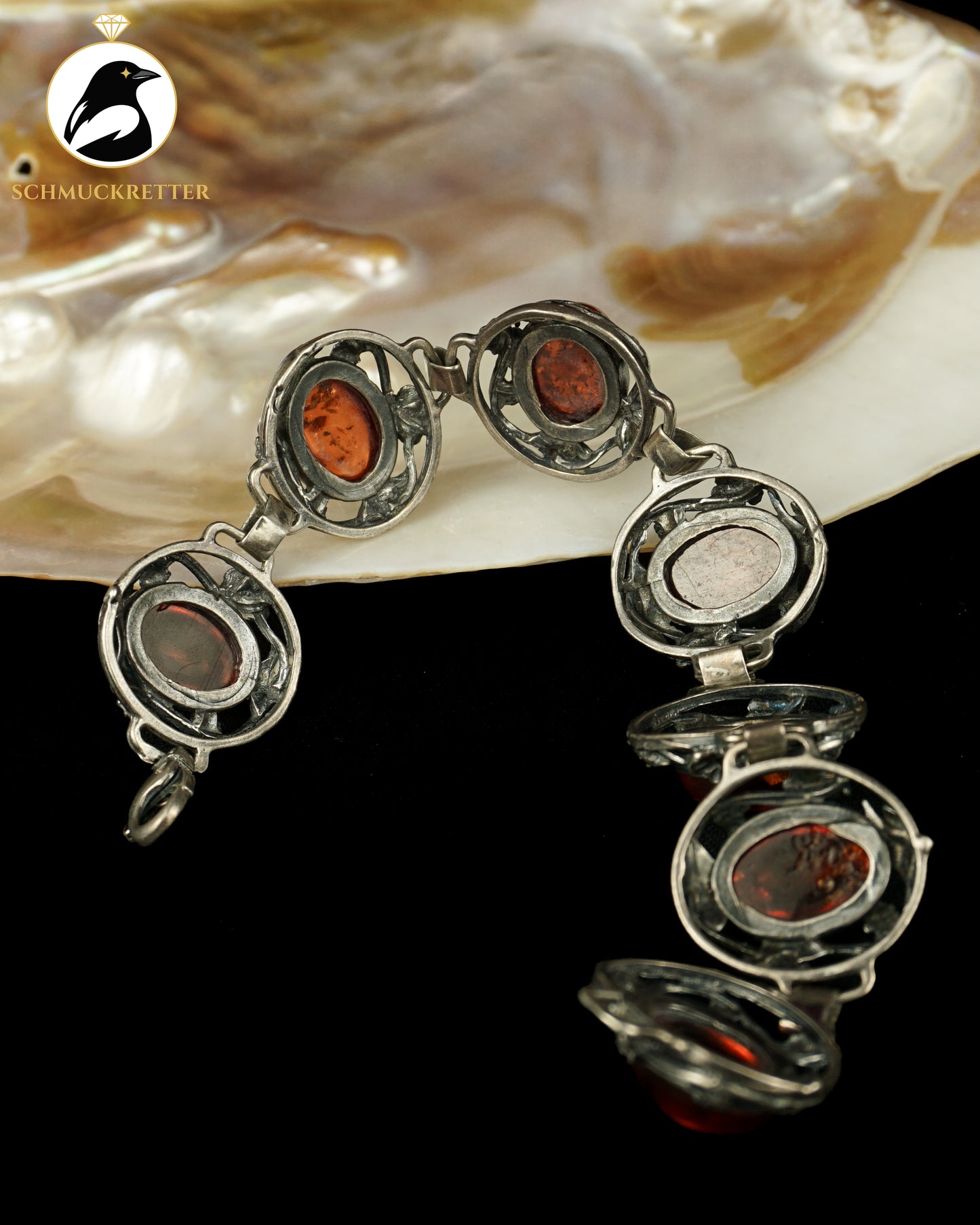 Bernsteinfeuer – verziertes 925 Silber Armband mit Bernstein aus Danzig