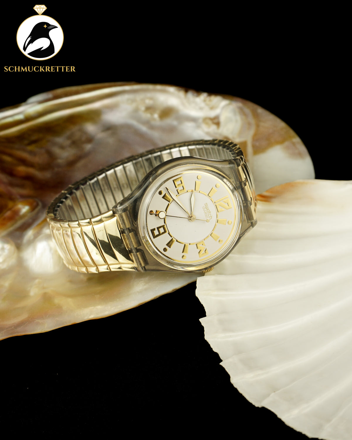 SWATCH Uhr mit vergoldetem Edelstahl-Band, dehnbar