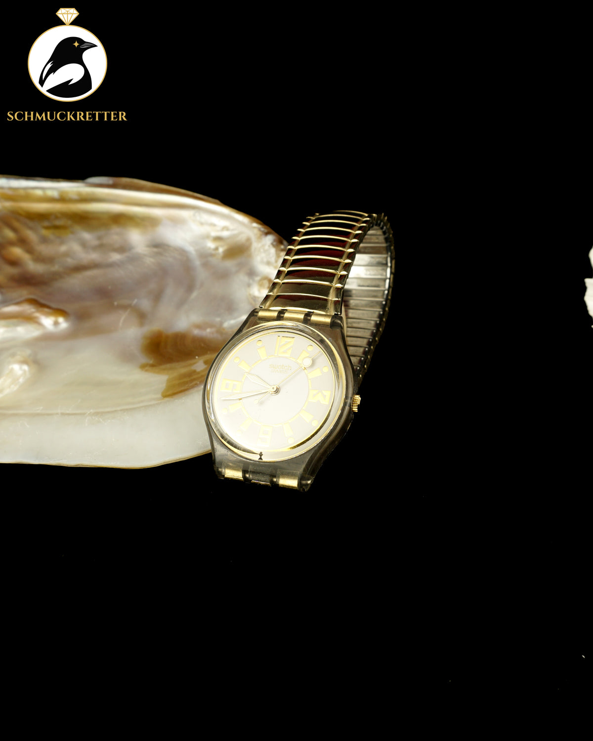 SWATCH Uhr mit vergoldetem Edelstahl-Band, dehnbar