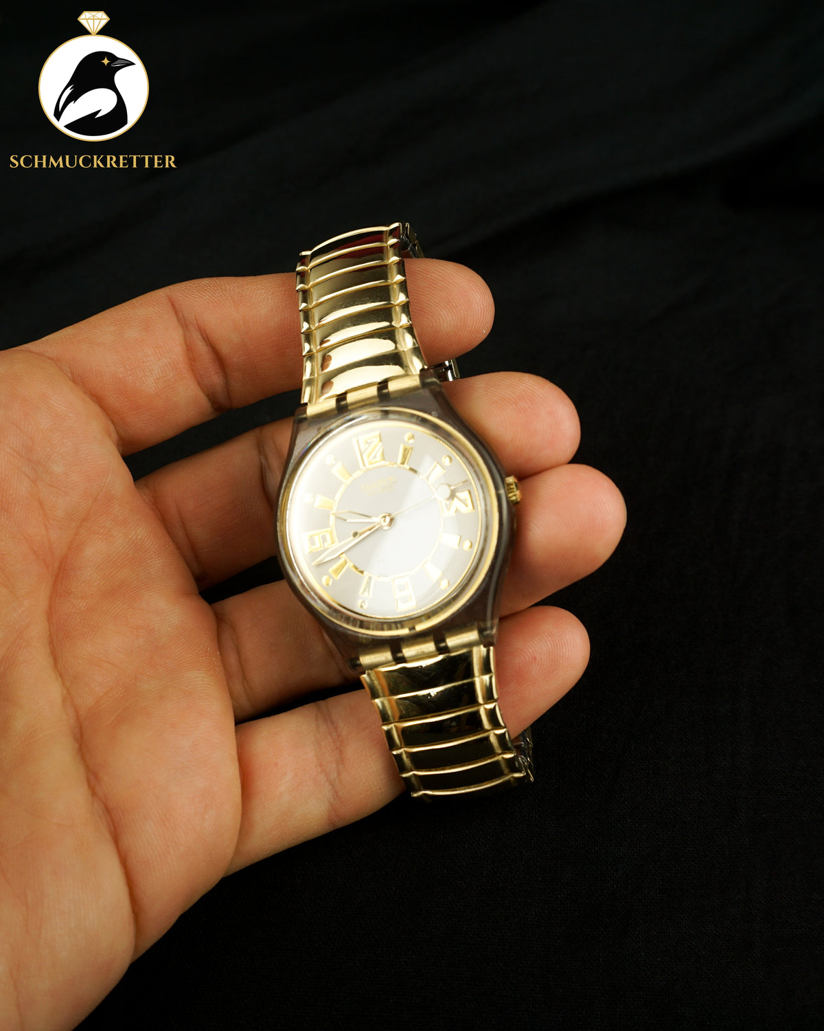 SWATCH Uhr mit vergoldetem Edelstahl-Band, dehnbar