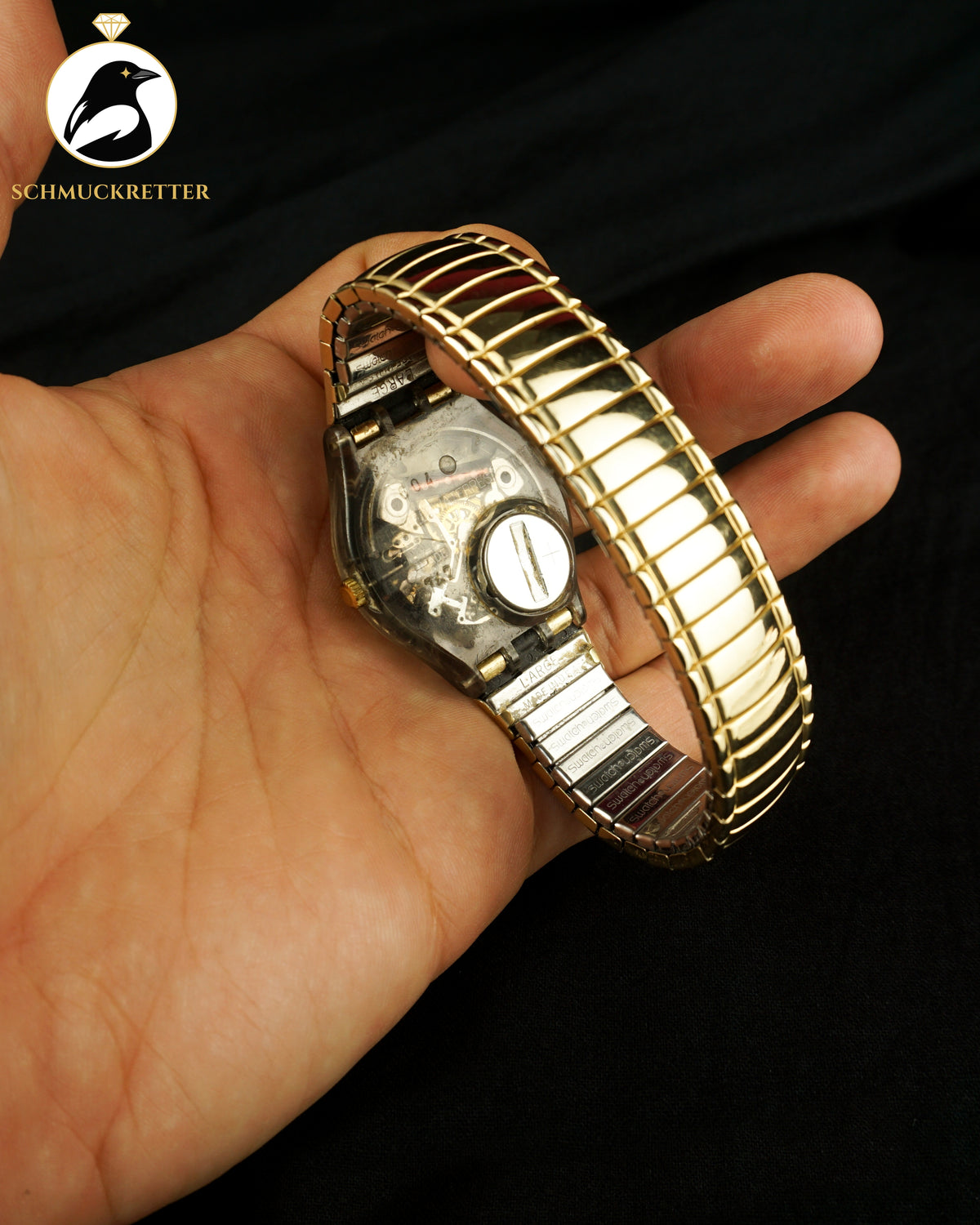 SWATCH Uhr mit vergoldetem Edelstahl-Band, dehnbar